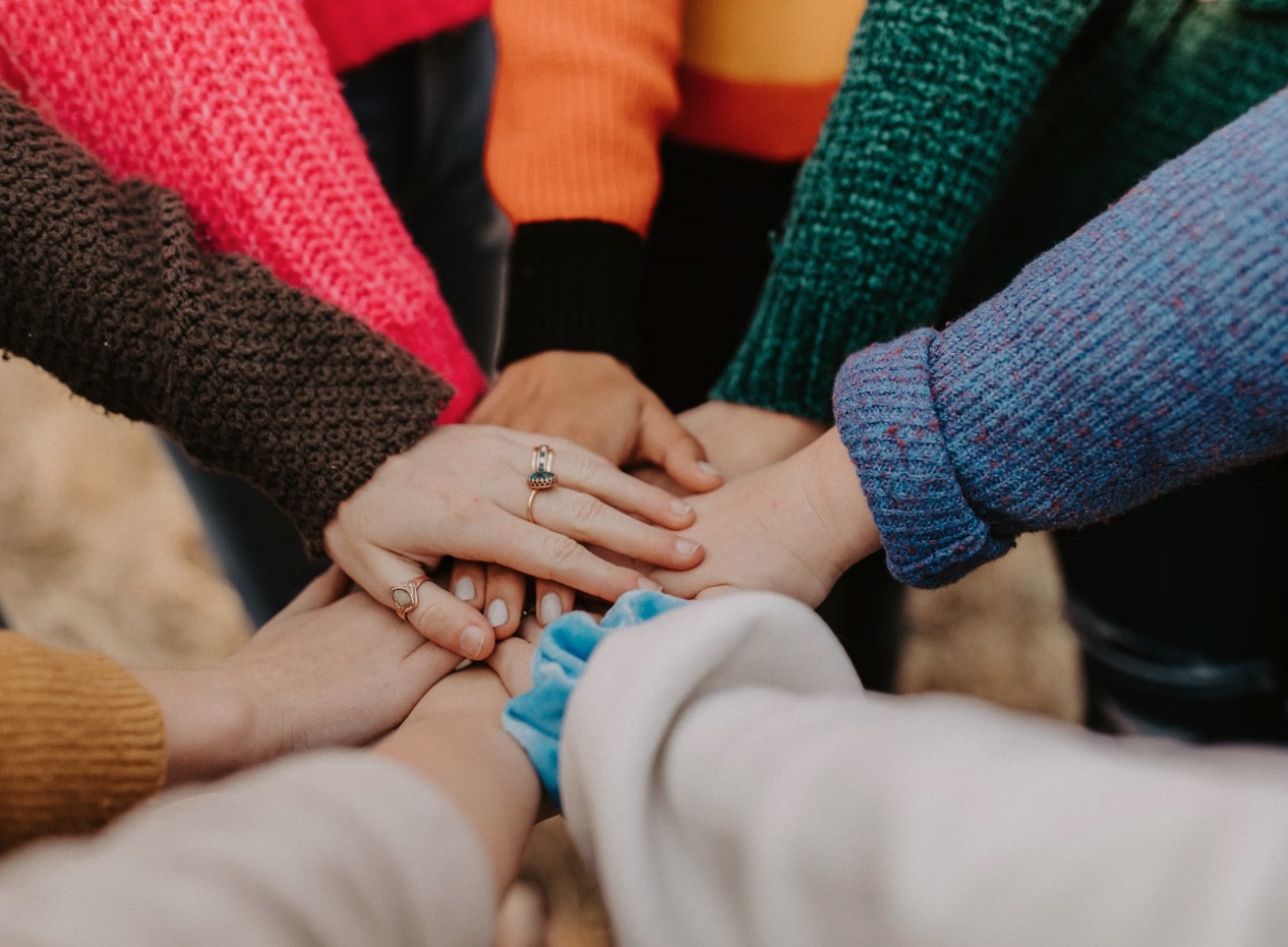Hands holding a globe during a planning session